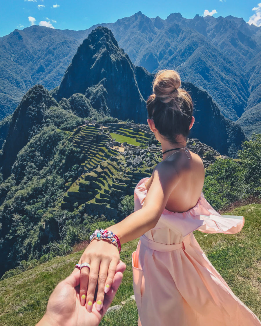 jessica wang wearing a pink ruffle strapless dress on vacation in peru while sharing 5 cute nail trends for the summer // Jessica Wang - Notjessfashion.com