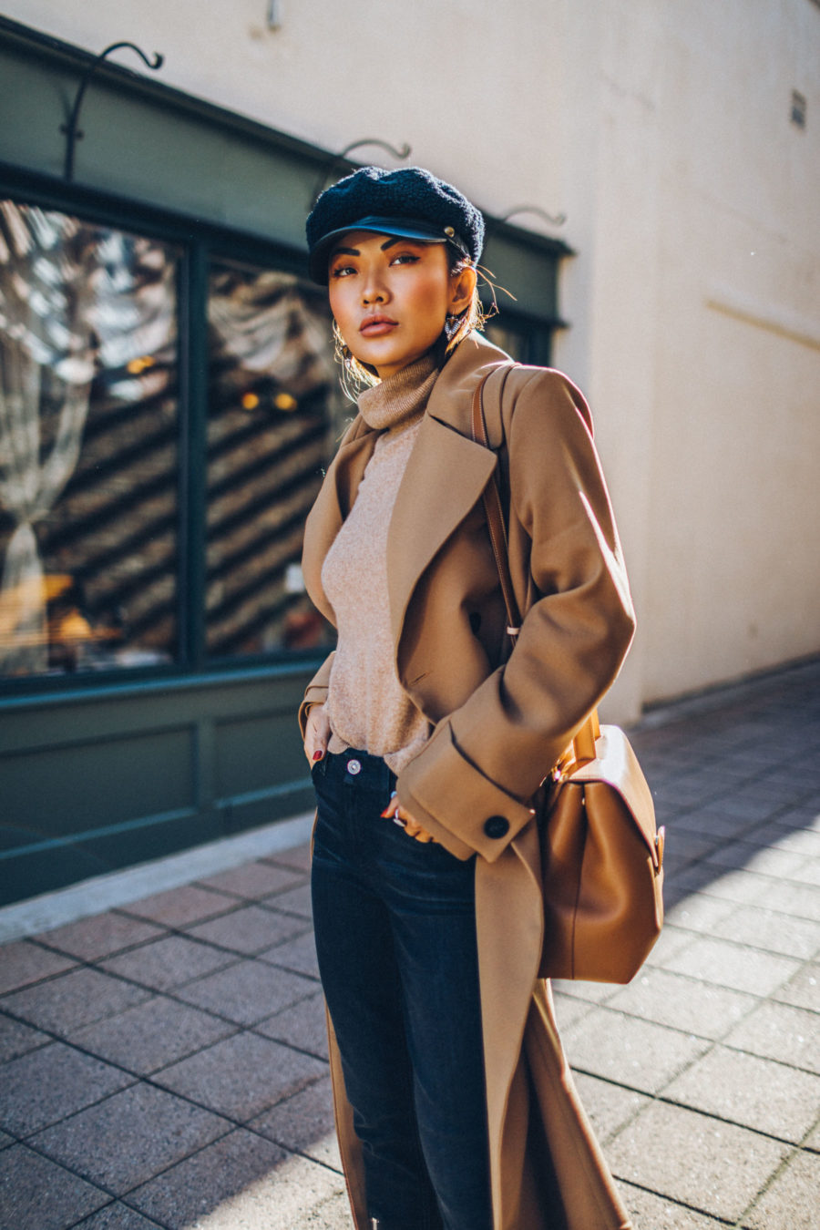 jeans and blazer outfit, baker boy hat, hats for fall, Belted Camel Coat with Dark Denim Baker Boy Cap and Satchel // Notjessfashion.com