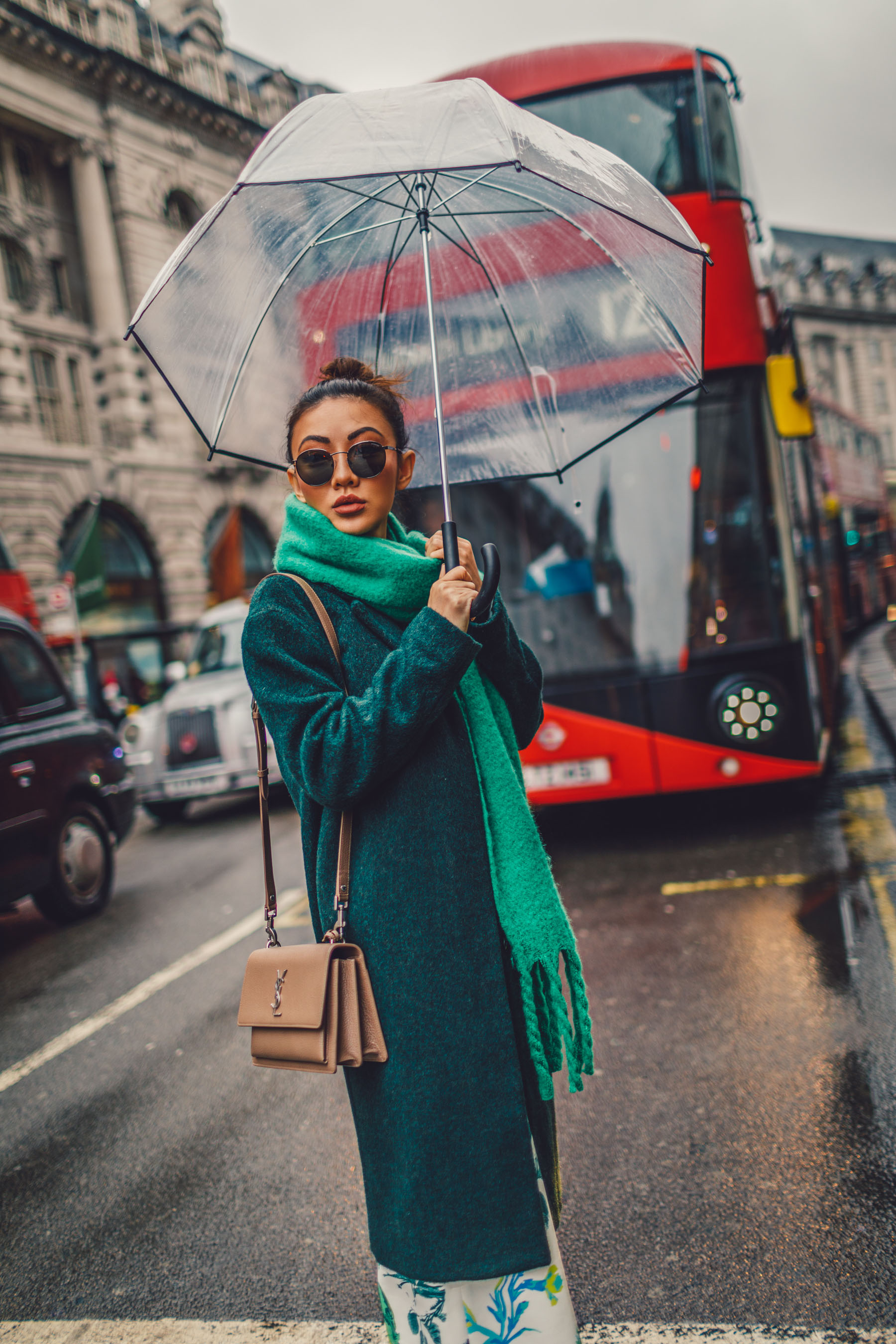 green floral skirt, green coat, dad sneakers, clear umbrella in london // Notjessfashion.com