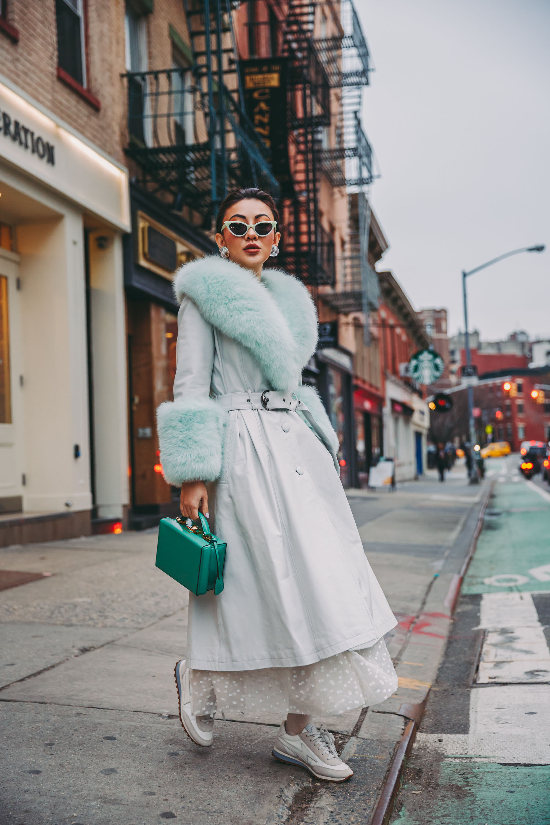 How to Wear Pastel in the winter -Mint fur coat, belted fur coat, nyfw street style // Notjessfashion.com