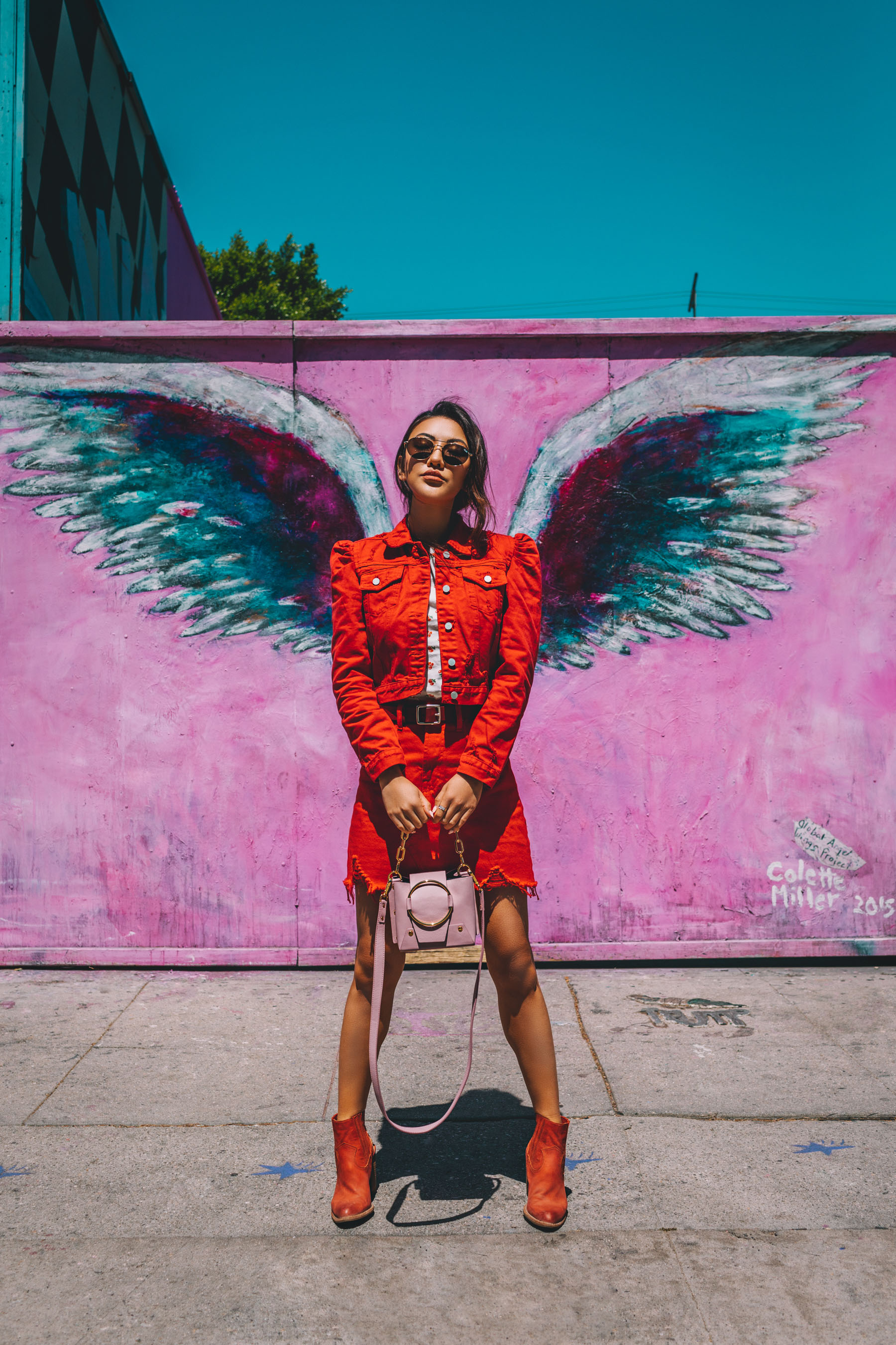 Bold Festival Style - Coachella Outfits Round Up, Red denim oufit, Los Angeles Graffiti Wing Wall // Notjessfashion.com