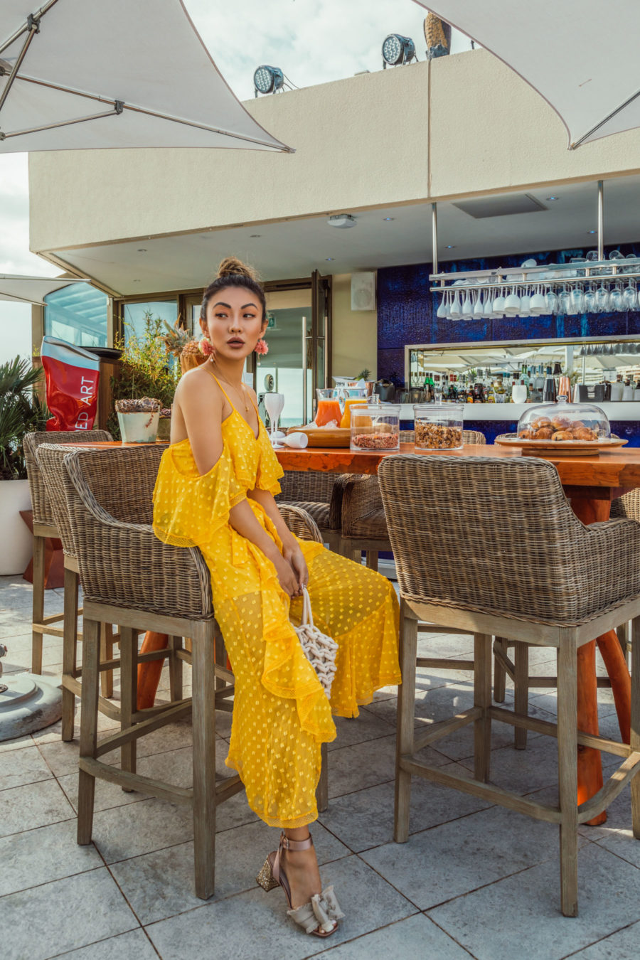 Step Up Your OOTD Photography with These Summer Outfit Details - Alice McCall yellow jumpsuit, satin block heels, knot bag // Notjessfashion.com