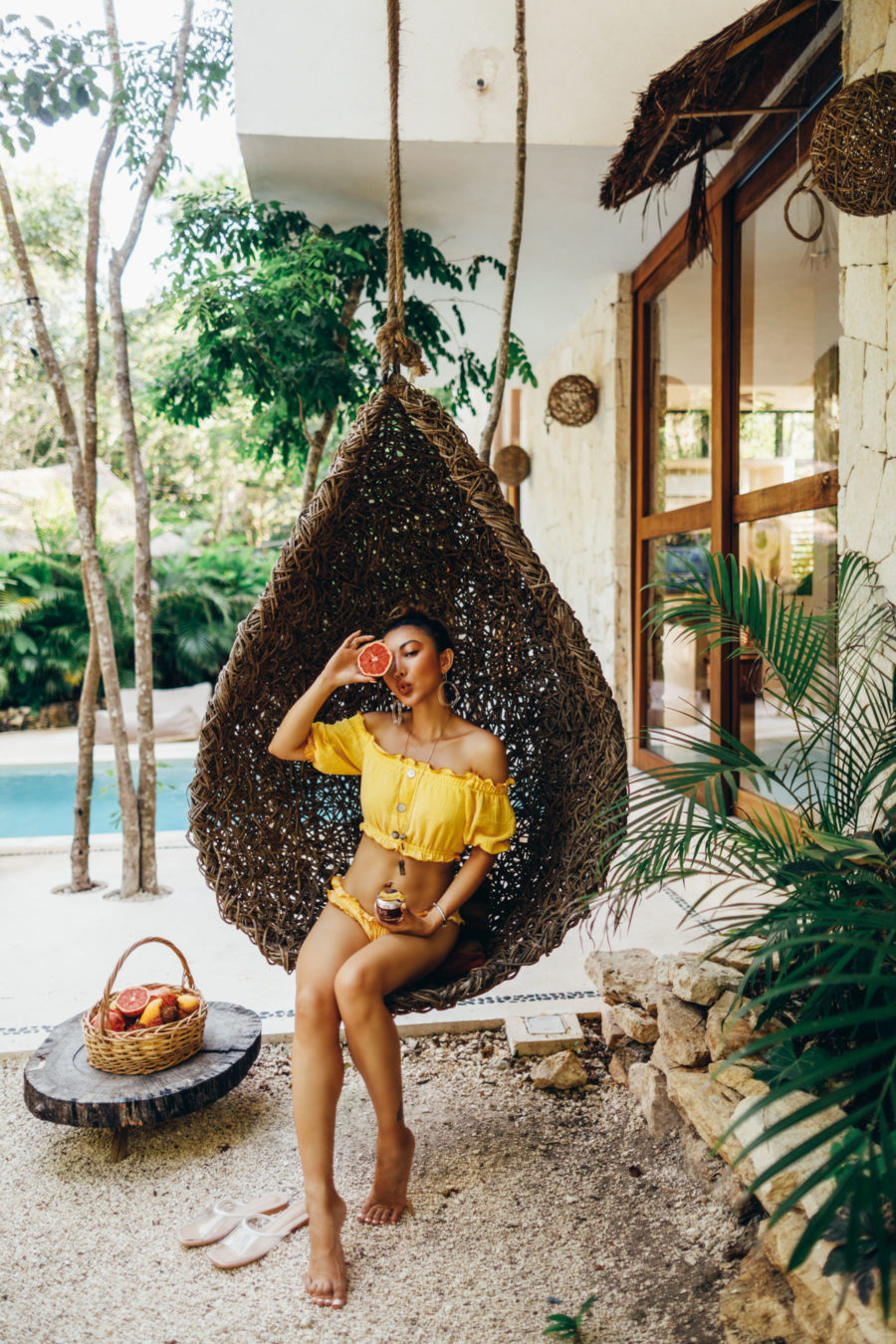 fashion blogger jessica wang wears yellow bikini and grapefruit while sharing foods that boost your immune system // Jessica Wang - Notjessfashion.com