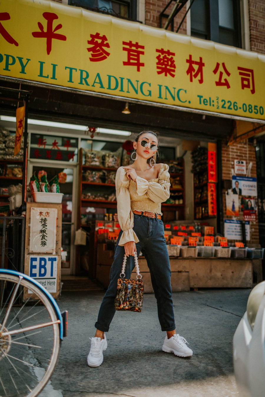 Shop your favorite fall trends with Afterpay at Urban Outfitters- BDG Mom Jeans, smocked top, western belt, hexagonal sunglasses, NYC fashion blogger // Notjessfashion.com