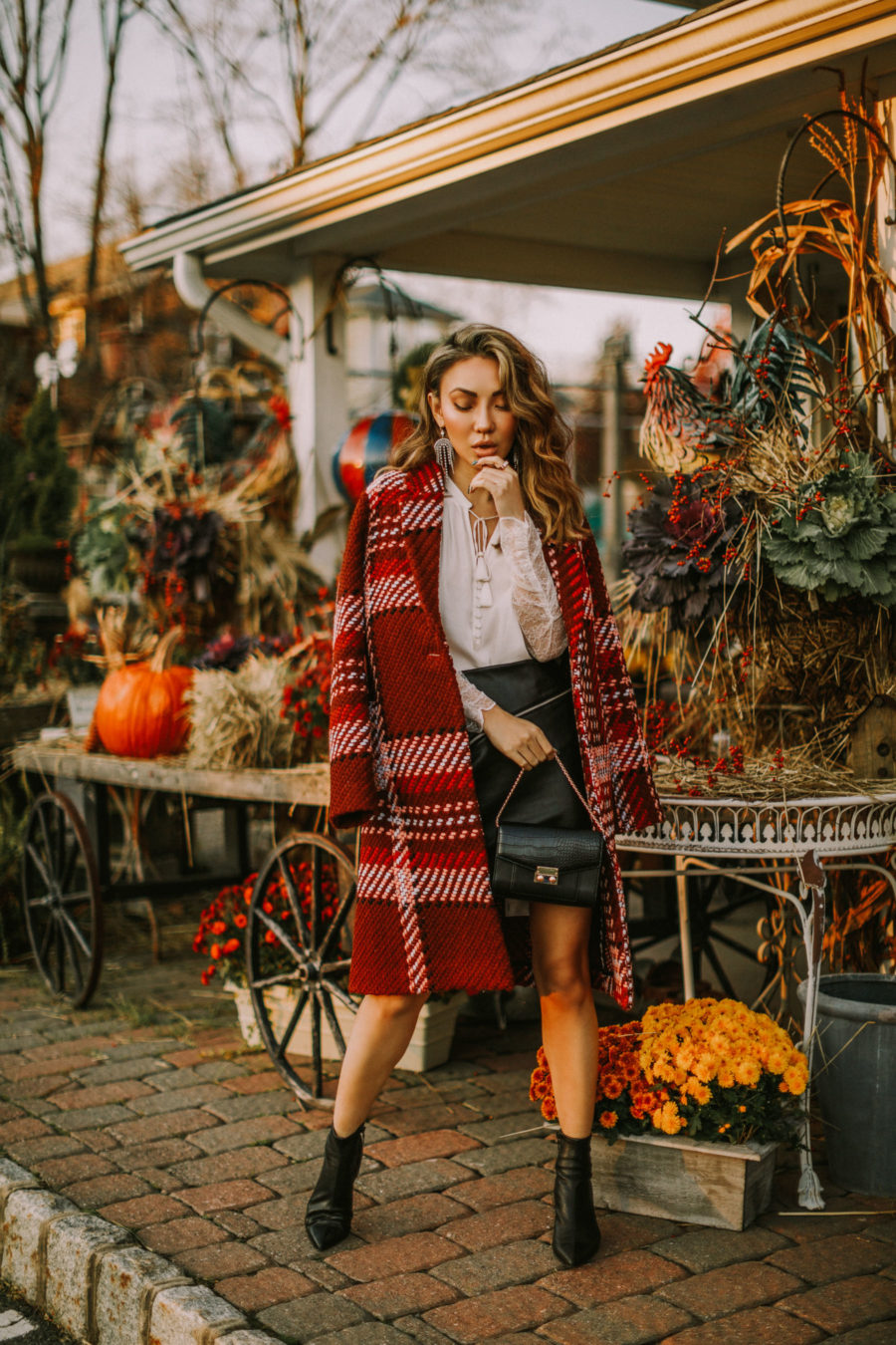 fashion blogger jessica wang shares chic christmas outfits for every day of the week in a plaid express coat and leather mini skirt // Notjessfashion.com