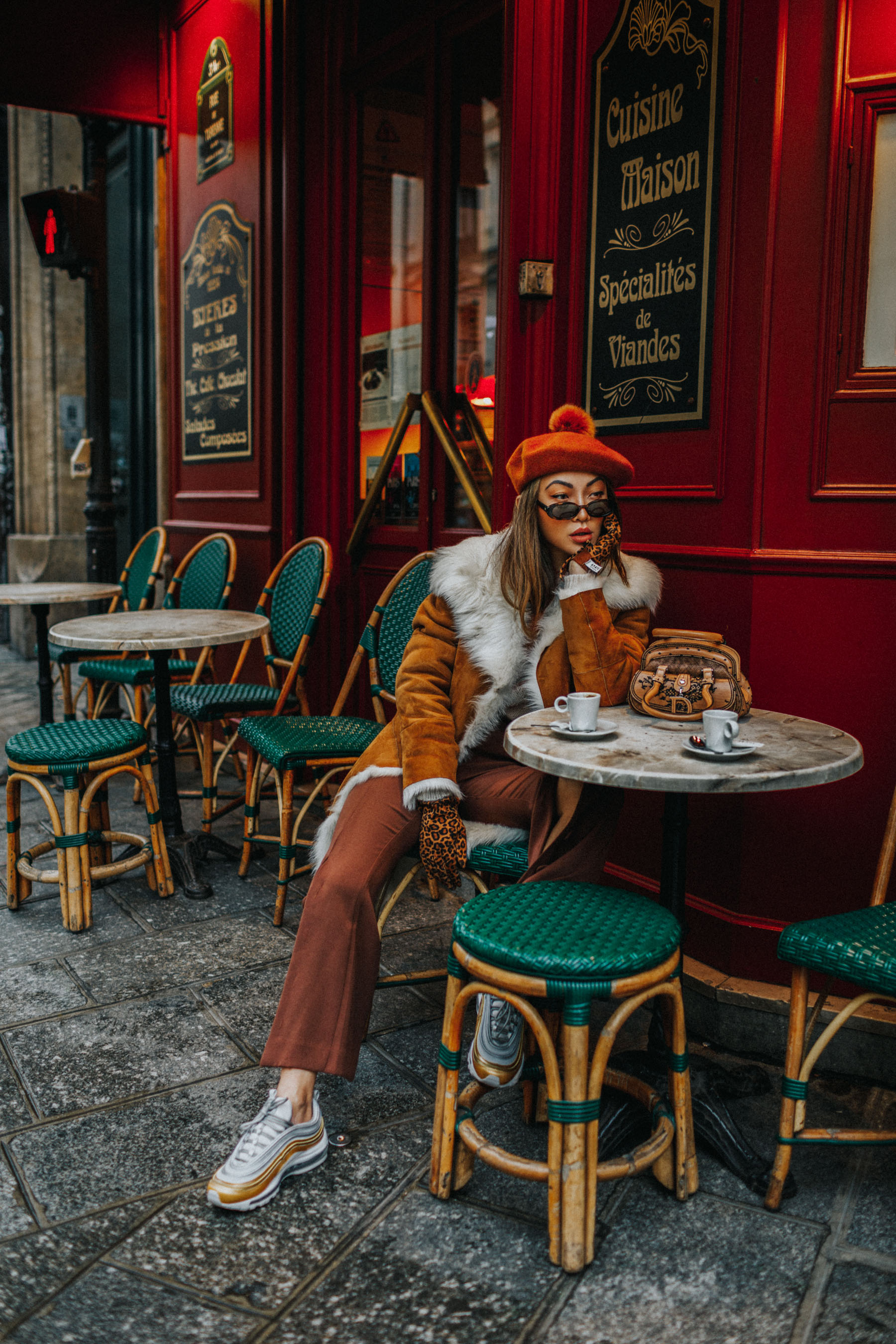 Winter Instagram Outfits - french cafe in the winter, faux fur shearling jacket, pompom beret // Notjessfashion.com
