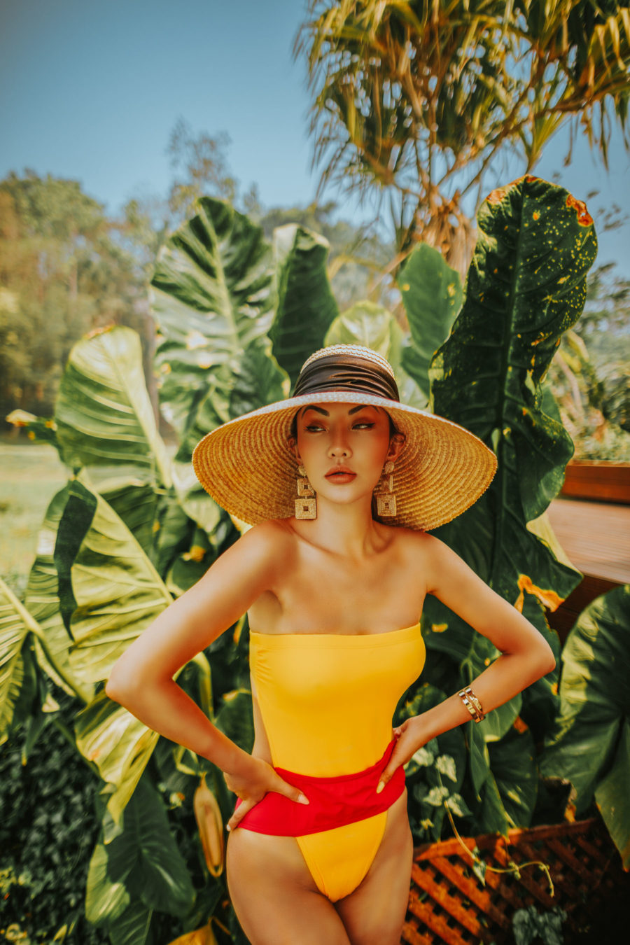 jessica wang wearing a one piece swimsuit and wide brim hat while sharing 2021 swim trends // Jessica Wang - Notjessfashion.com