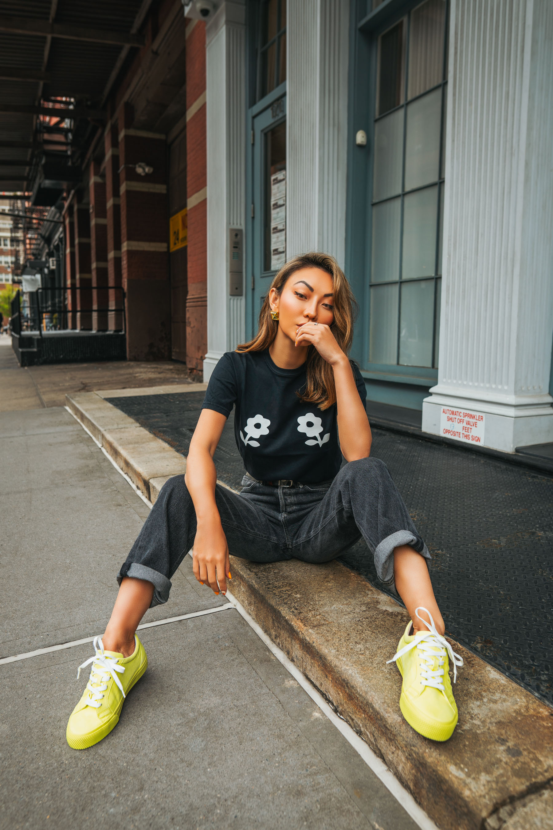 what to wear on a lazy day, black denim, black graphic tee, yellow sneakers // Notjessfashion.com