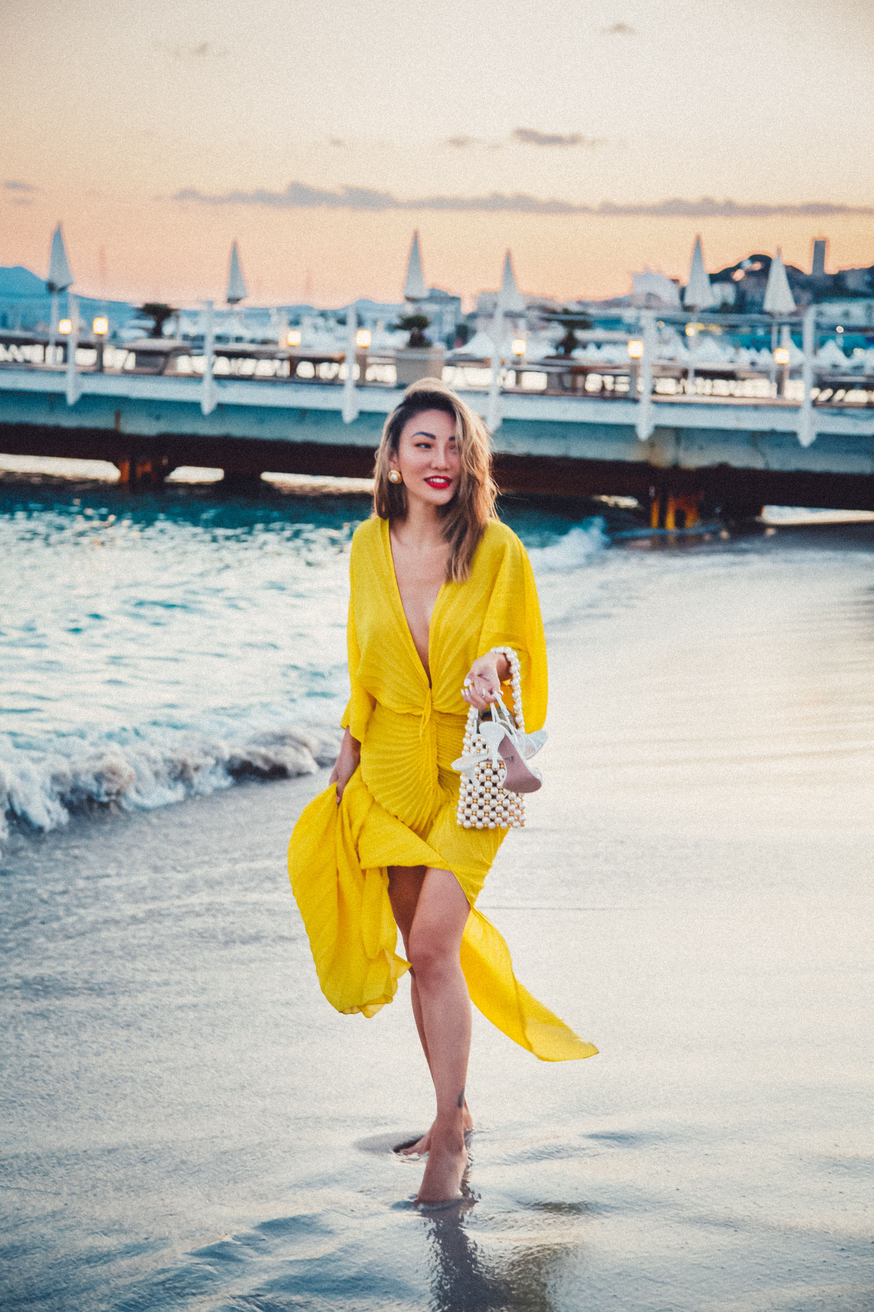 how to wear a dress without a bra, yellow pleated dress, plunging neckline dress // Notjessfashion.com