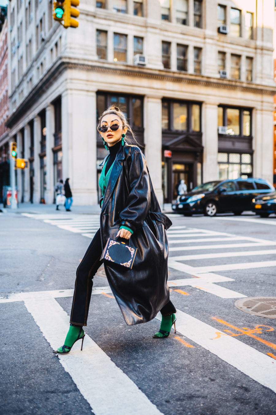 fashion blogger jessica wang shares the best winter coats and wears a leather trench coat with socks and sandals // Notjessfashion.com