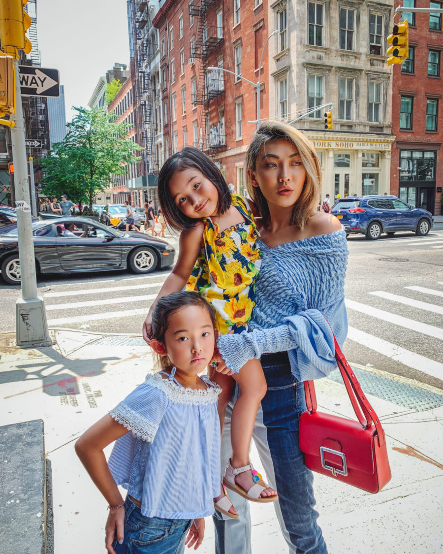 fashion blogger jessica wang spreads awareness on World Children's Day and wears smocked top with two tone jeans with red bally handbag // Notjessfashion.com