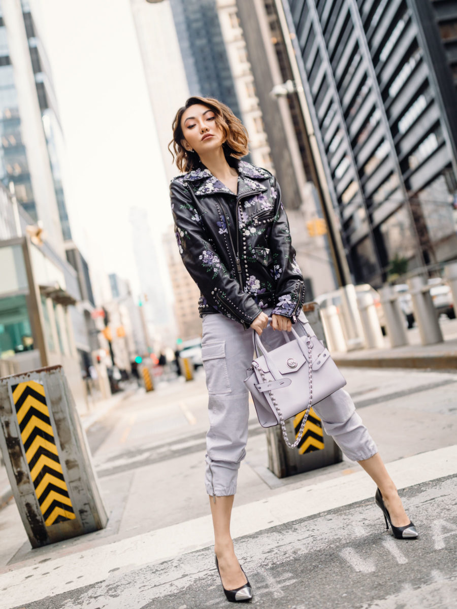 casual cool outfit with michael kors lavender joggers and embellished leather jacket // Jessica Wang - Notjessfashion.com