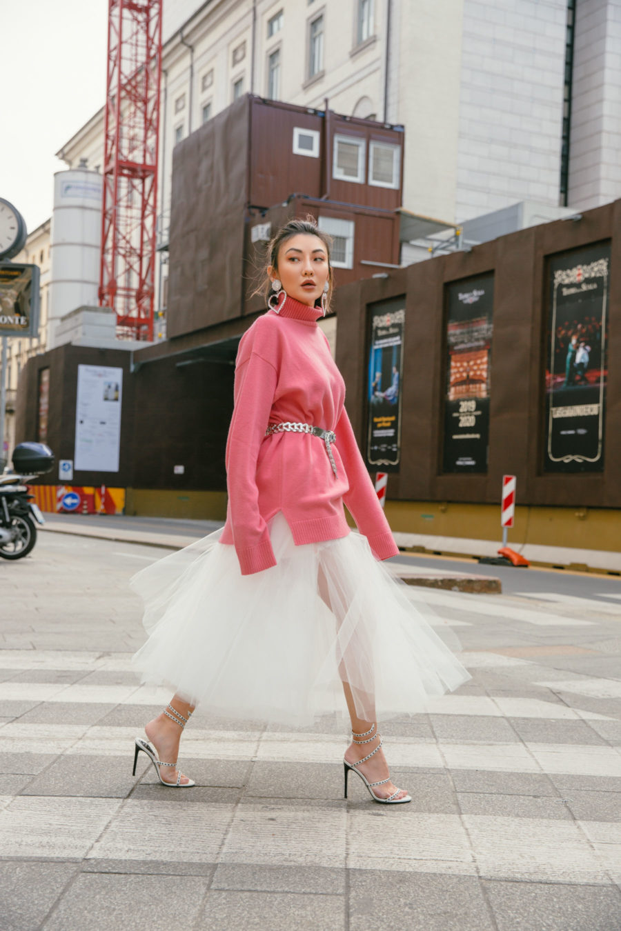spring trends that are worth the investment featuring loewe coral pink sweater and unravel denim tulle skirt // Notjessfashion.com