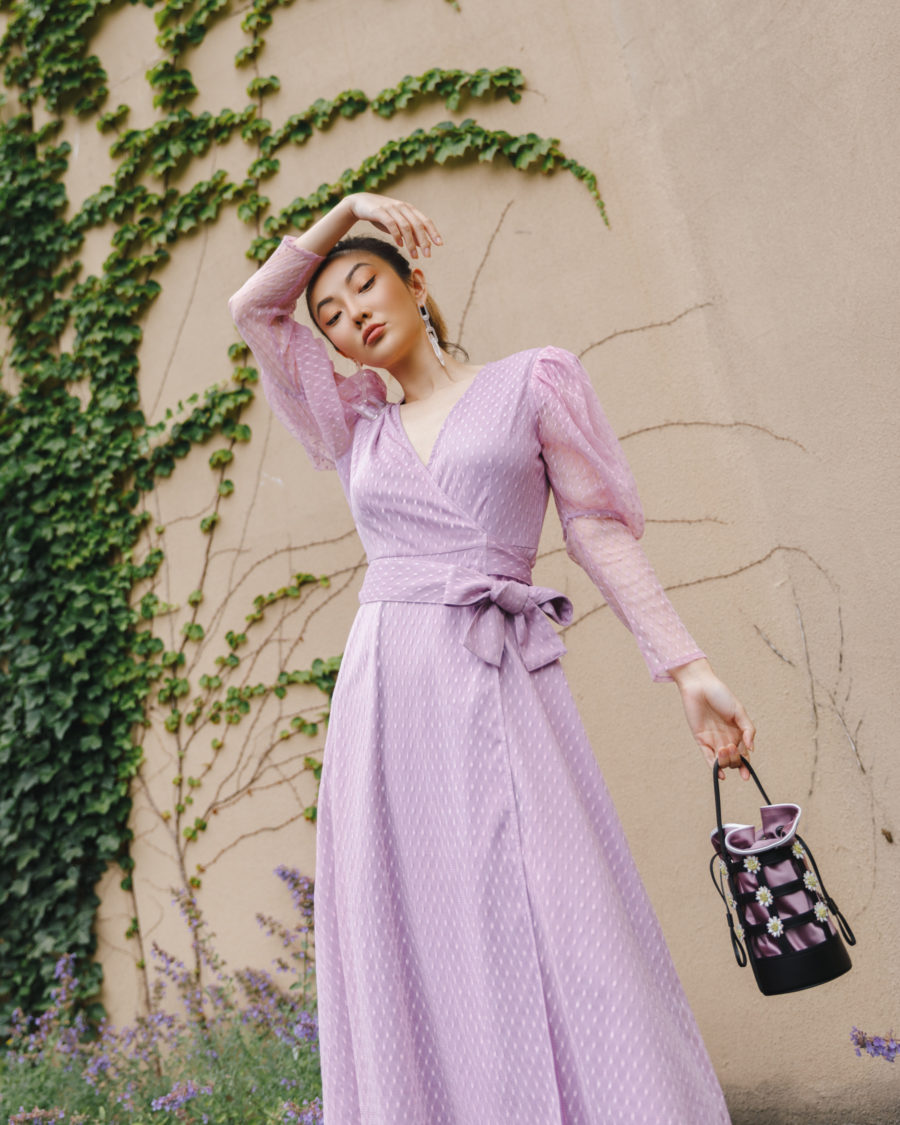jessica wang wearing a lavender dress with a satin bucket bag while sharing her favorite wedding guest dresses from amazon // Jessica Wang - Notjessfashion.com