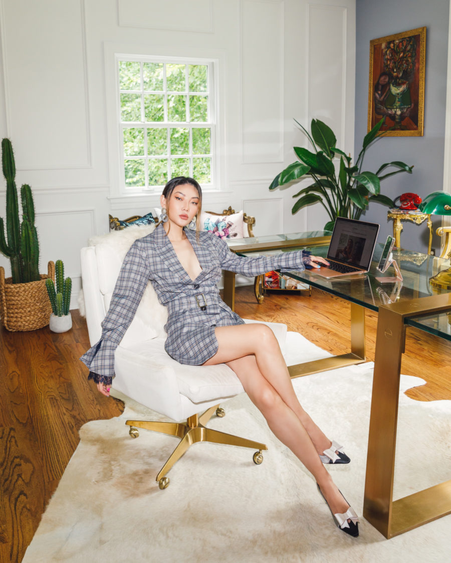 Jessica Wang wearing a plaid blazer dress in her home office while sharing her productivity tips // Jessica Wang - Notjessfashion.com