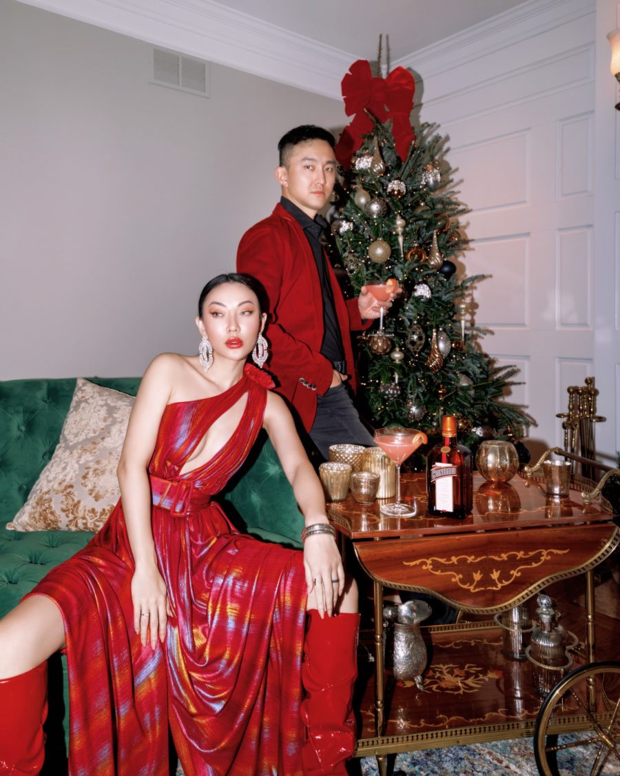 Jessica Wang wearing a red one shoulder dress with slouchy boots while sharing her 2021 gift ideas for men // Jessica Wang - Notjessfashion.com