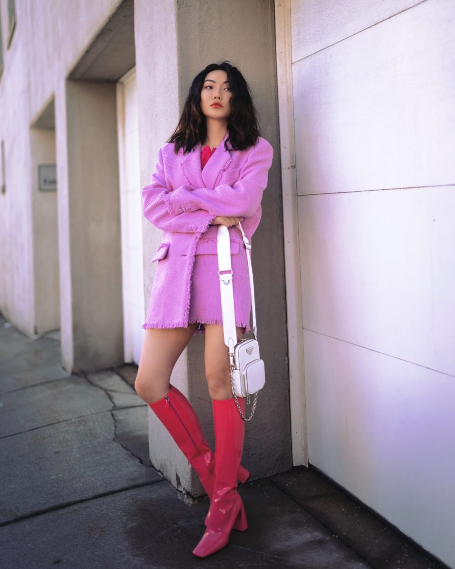 how to Wear lavender spring 2021 - Pink MSGM fringe blazer and shorts, fuschia ruffle top, prada knee high boots, prada Saffiano triangle-logo mini bag // Jessica Wang - Notjessfashion.com