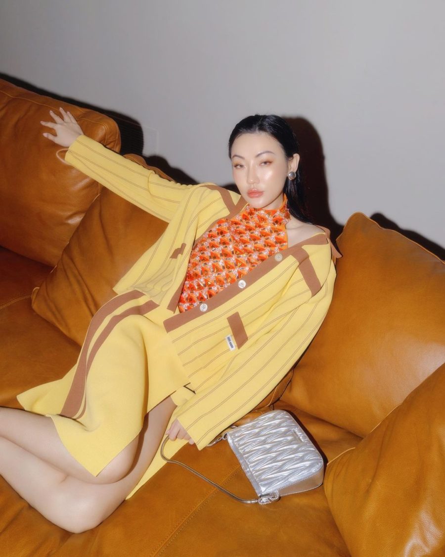 jessica wang wearing a yellow sweater with a matching skirt and holding a silver miu miu purse while sharing trendy handbags for summer // Jessica Wang - Notjessfashion.com