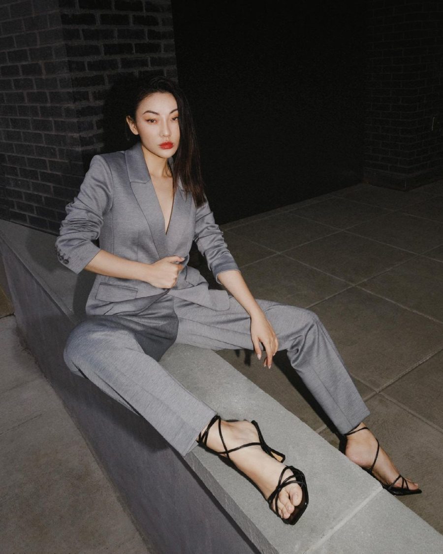 jessica wang wearing a gray blazer and matching pants with strappy heels while sharing night out outfits for summer // Jessica Wang - Notjessfashion.com