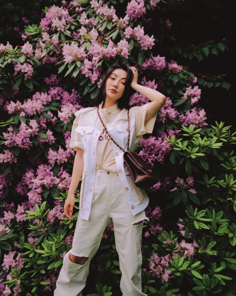 Jessica Wang wearing a beige vest jacket featuring baum und pferdgarten, distressed jeans in white, and AGL cut out ankle boots with a chanel chain handbag while sharing tips on becoming an influencer in 2021 // Jessica Wang - Notjessfashion.com