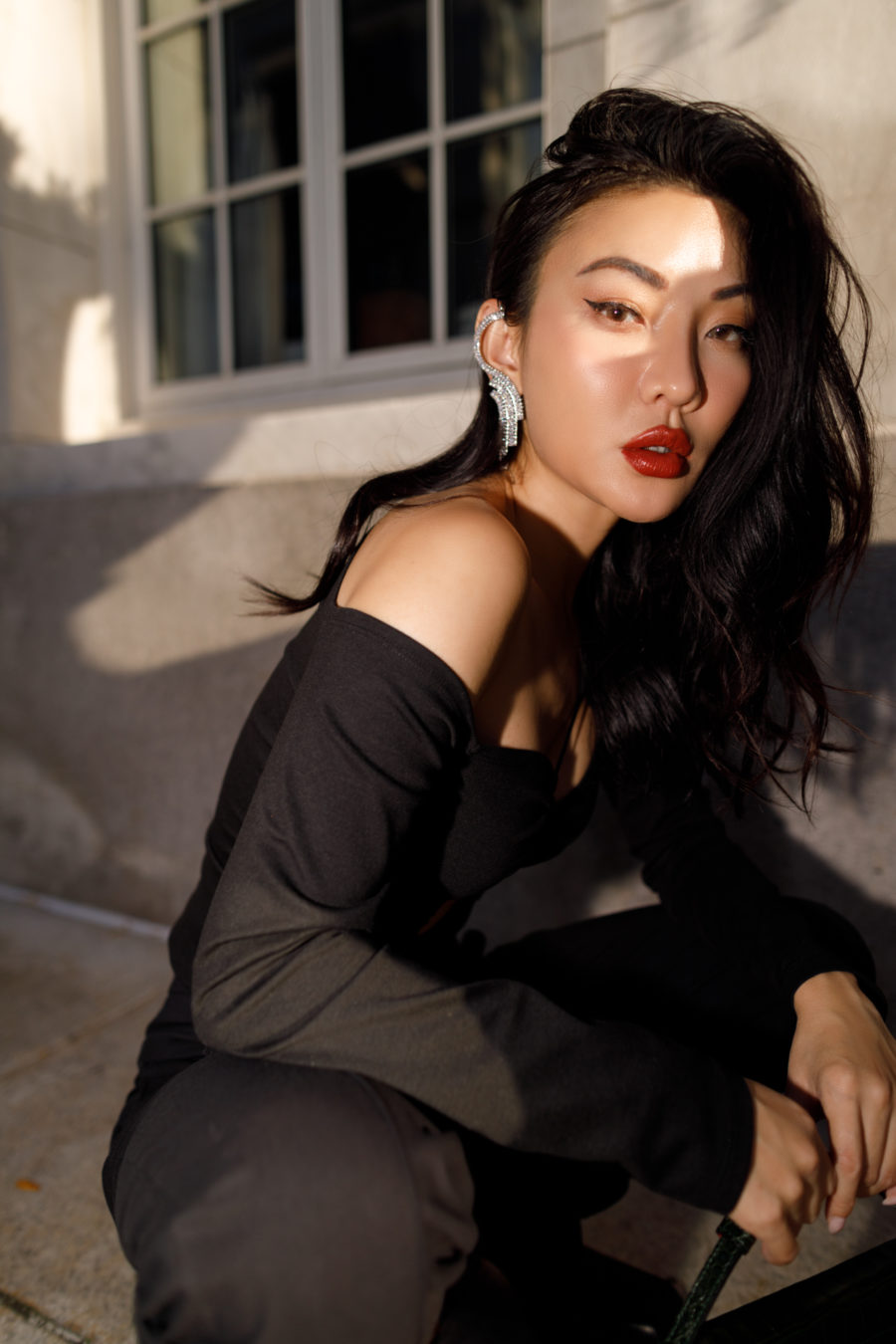 Jessica Wang wearing luxe accessories featuring a cut out top and ear crawlers // Jessica Wang - Notjessfashion.com
