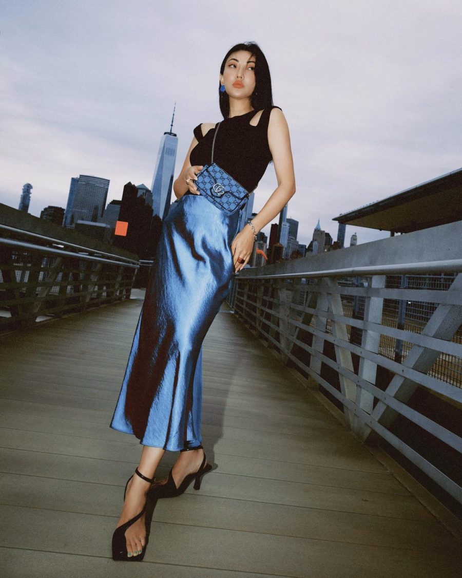 Jessica Wang wearing a black cutout top with a blue slip skirt while taking family photo outfits // Jessica Wang - Notjessfashion.com