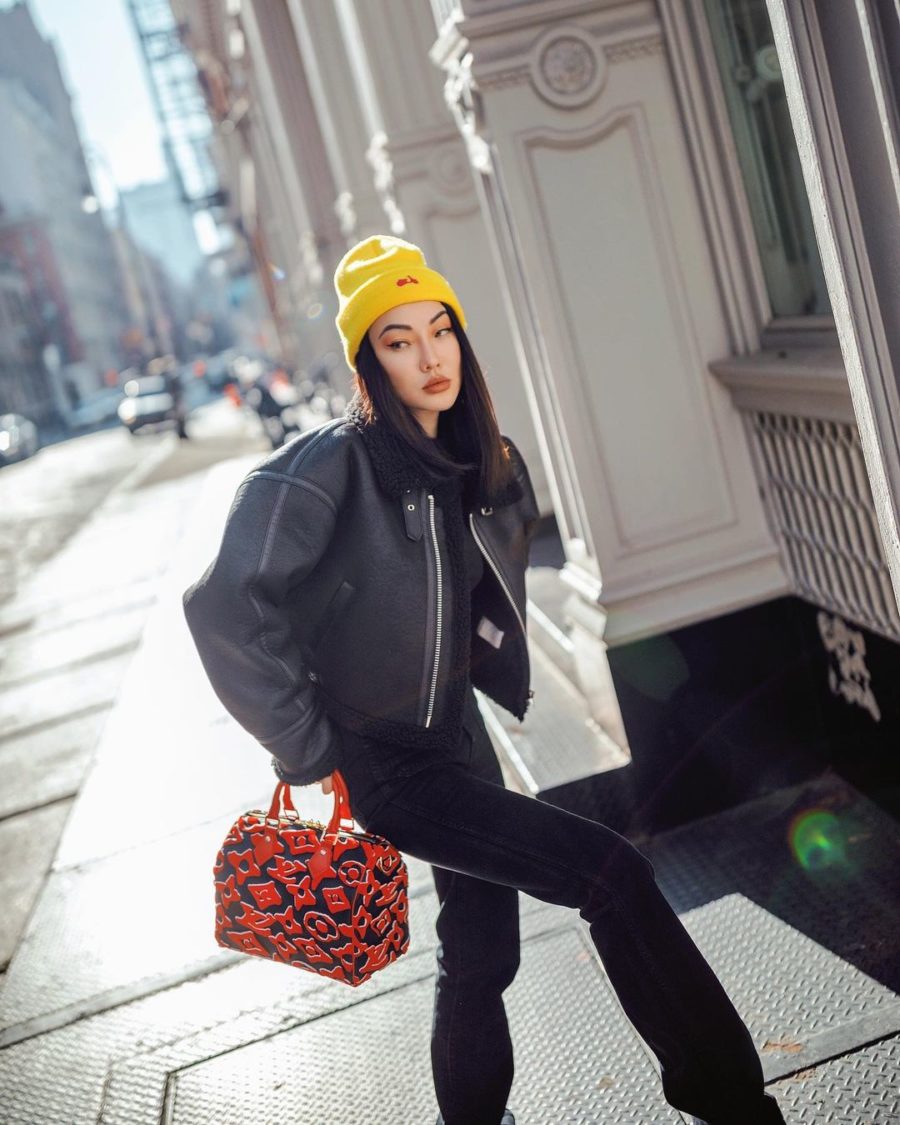 Jessica Wang wearing a cropped shearling lined leather jacket with black denim jeans and a louis vuitton bag // Jessica Wang - Notjessfashion.com