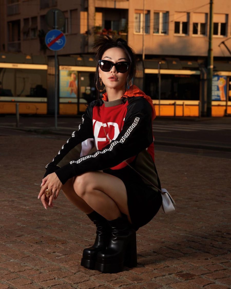 spring summer 2022 trends featuring Jessica Wang wearing versace logo sweater dress with platform boots // Jessica Wang - Notjessfashion.com